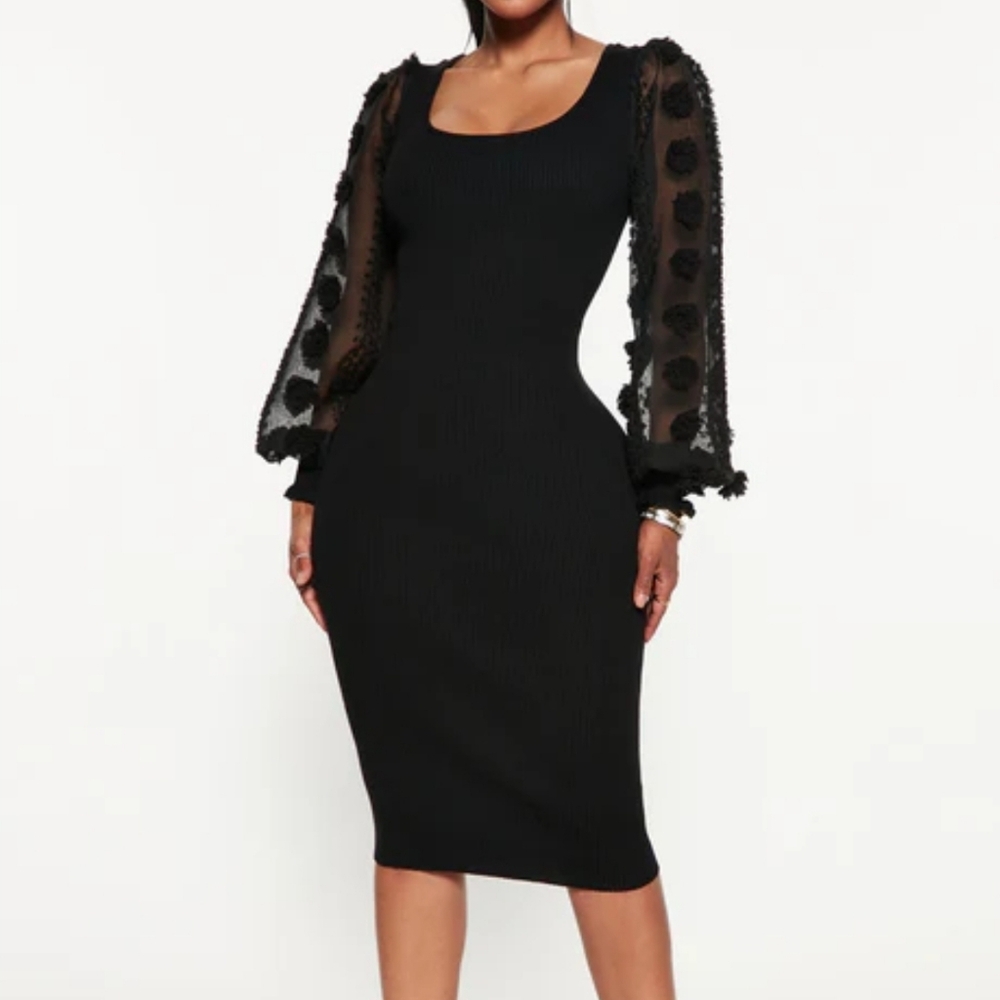 Elegant Black Sweater Dress with Sheer Sleeves